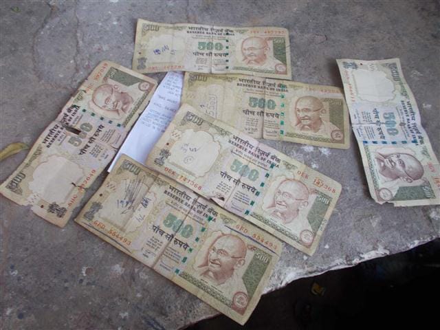 Cutted and Fake Notes found in ATM