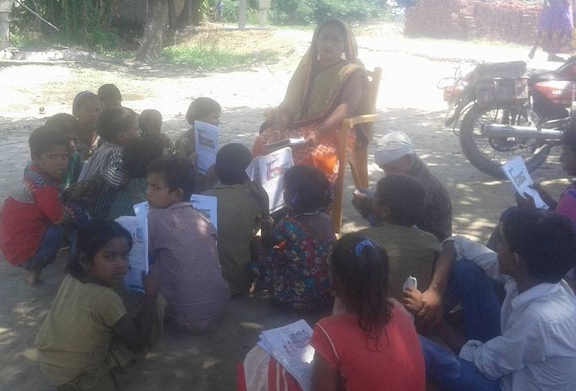 Children were studying under trees