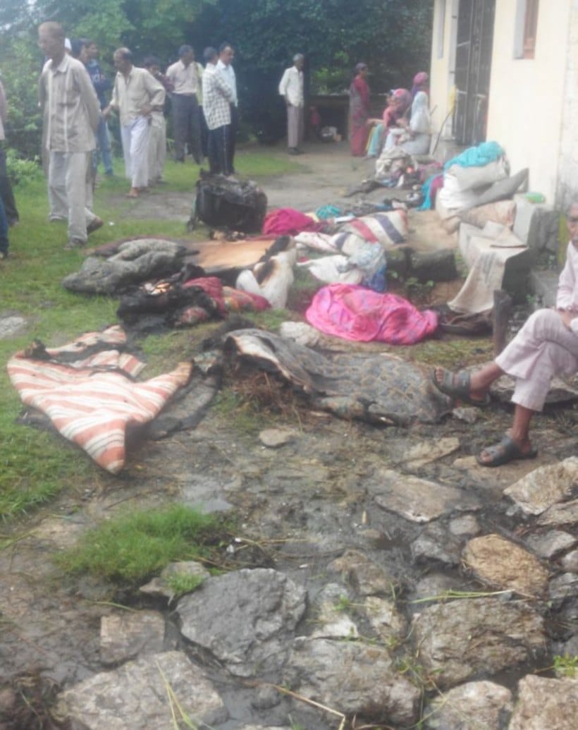 women murderd, dead body found in pile of quilts.