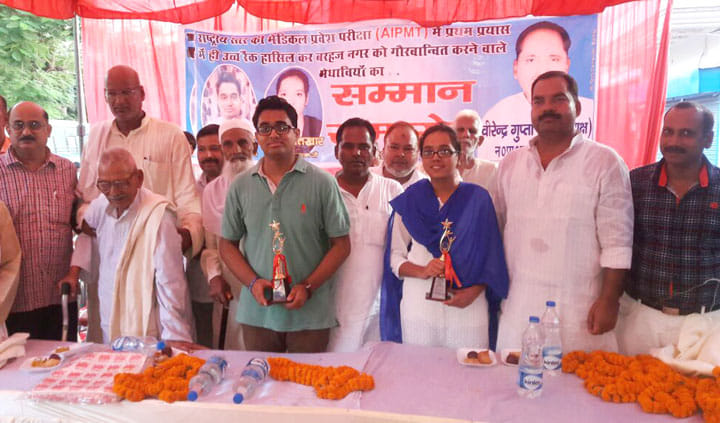 The ceremony honored two outstanding city