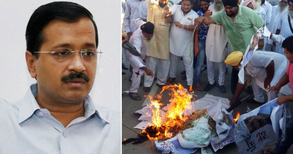 Protest against kejriwal, sucha singh supporters burn kejriwal posters