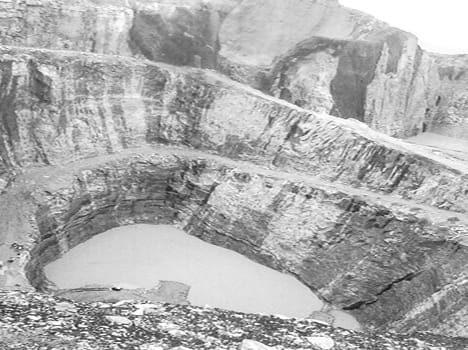 Water-filled quarries, mining stagnated