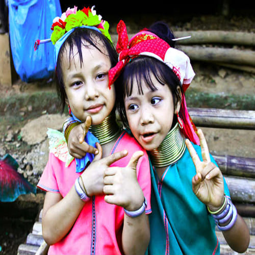 kayan tribe women wear multiple rings all around