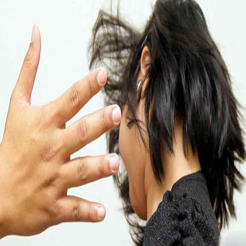 beating behind the head of a child