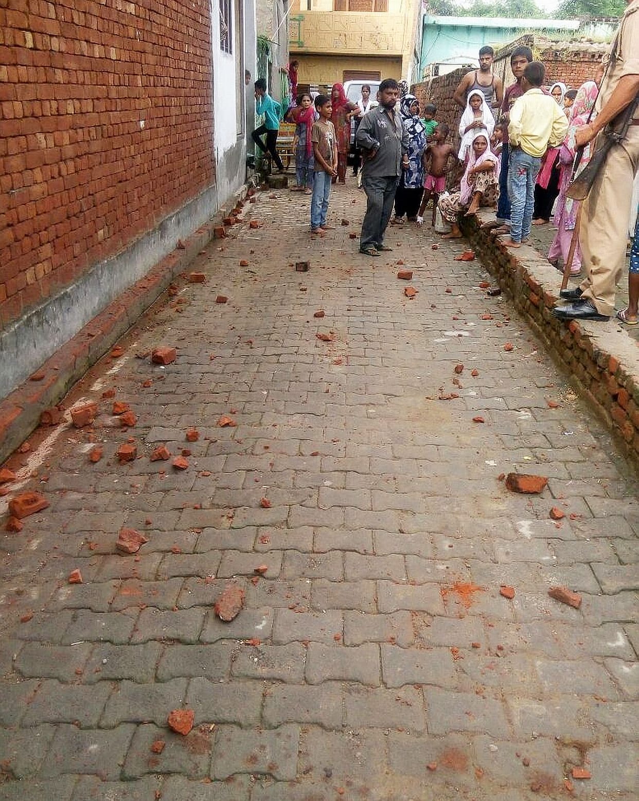 Children threw stones at the altercation, firing