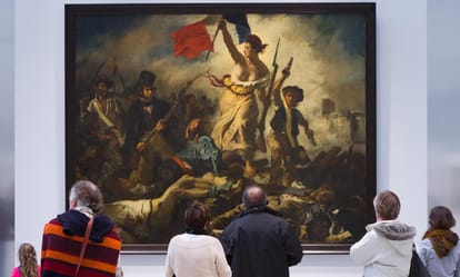 French PM Manuel Valls suggests naked breasts represent France better than a headscarf