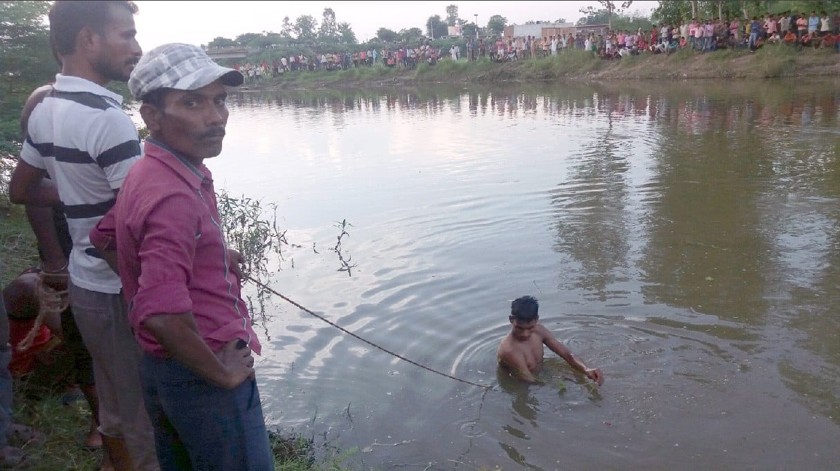 Man fishing in the river dipped