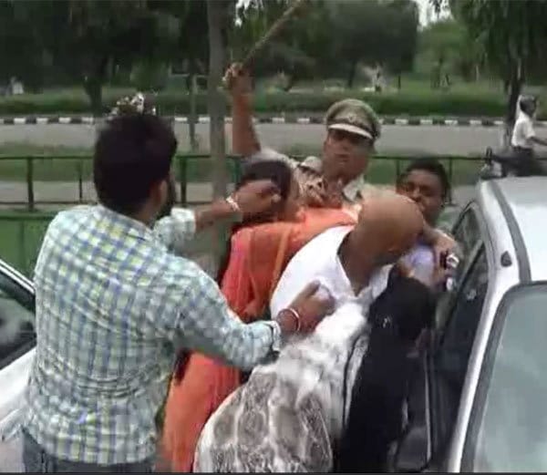 boy beaten with chappal by married girl friend family outside women commission office