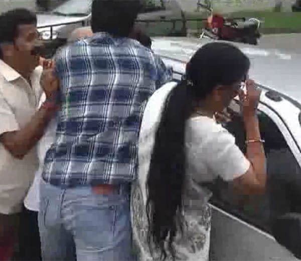 boy beaten with chappal by married girl friend family outside women commission office