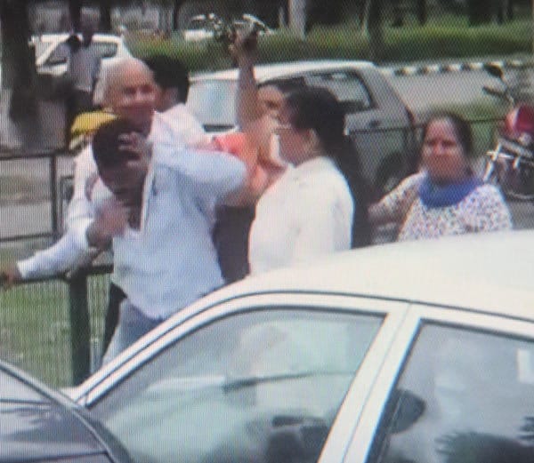 boy beaten with chappal by married girl friend family outside women commission office