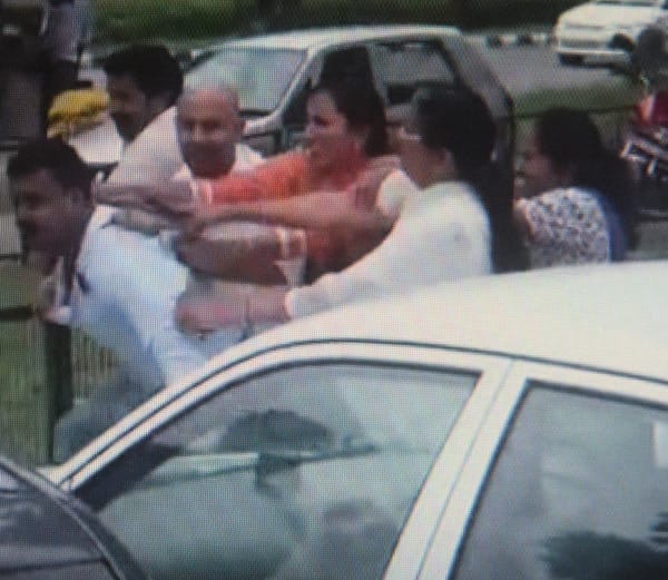 boy beaten with chappal by married girl friend family outside women commission office