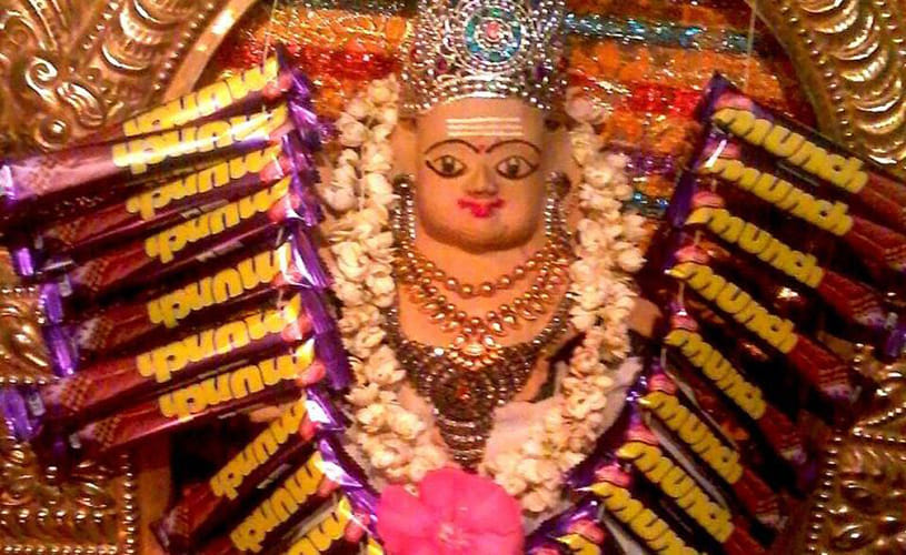 temple where devotees offer chocolate bars to god