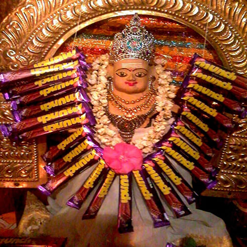 temple where devotees offer chocolate bars to god