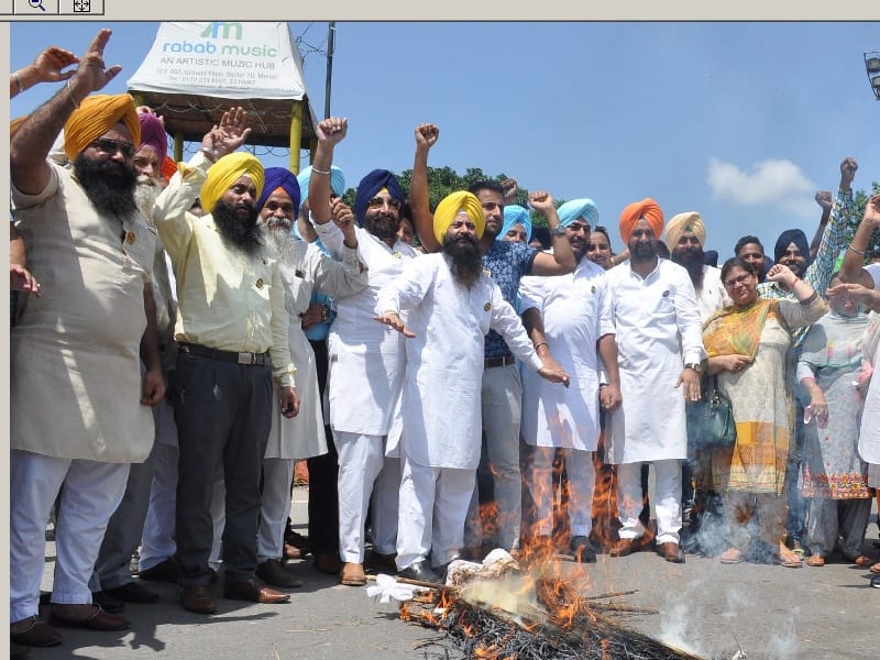 AAP, Aam Admi Party, Mohali, Protest, Bhagwant maan, Akali, BJP, Akali-Bjp