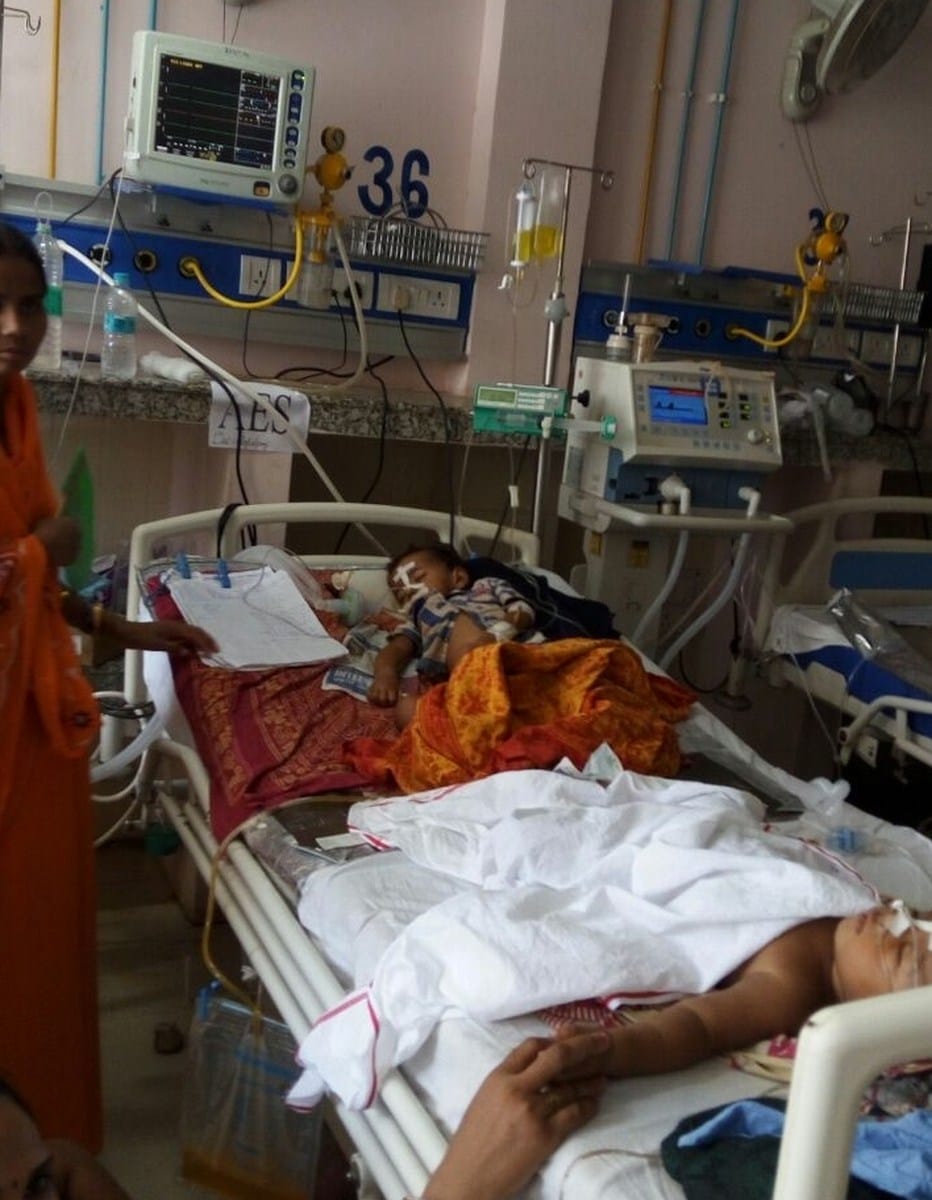 doctors are quarreling on Two patients on one bed in encephalytis ward