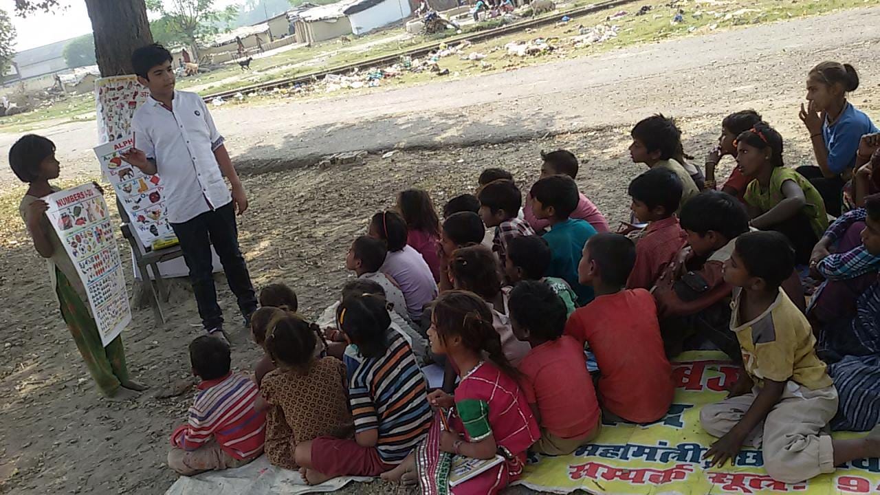 school kid anand krishna mishra teaches slum kid