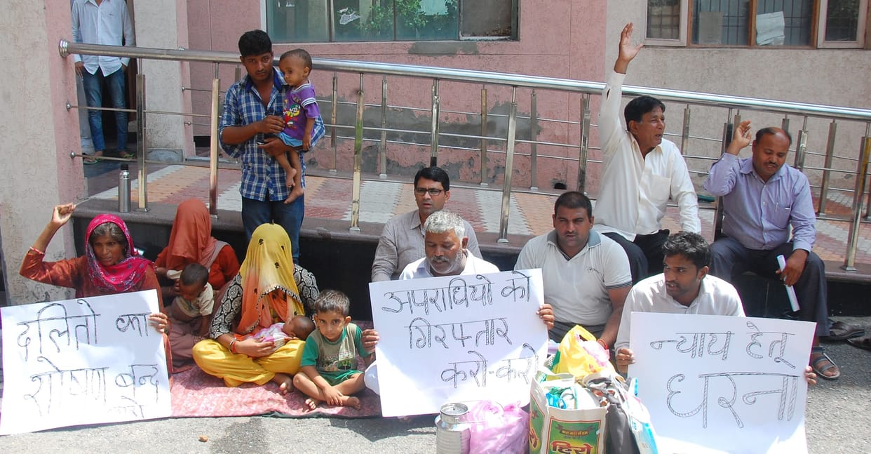 Dalit family left the village, fearing of powerful people, return in police security 