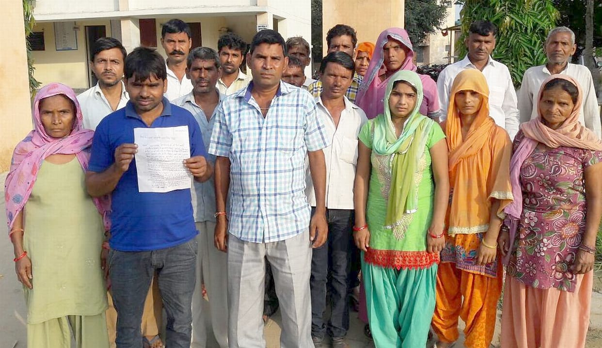 By striking the head, killing innocent abducted