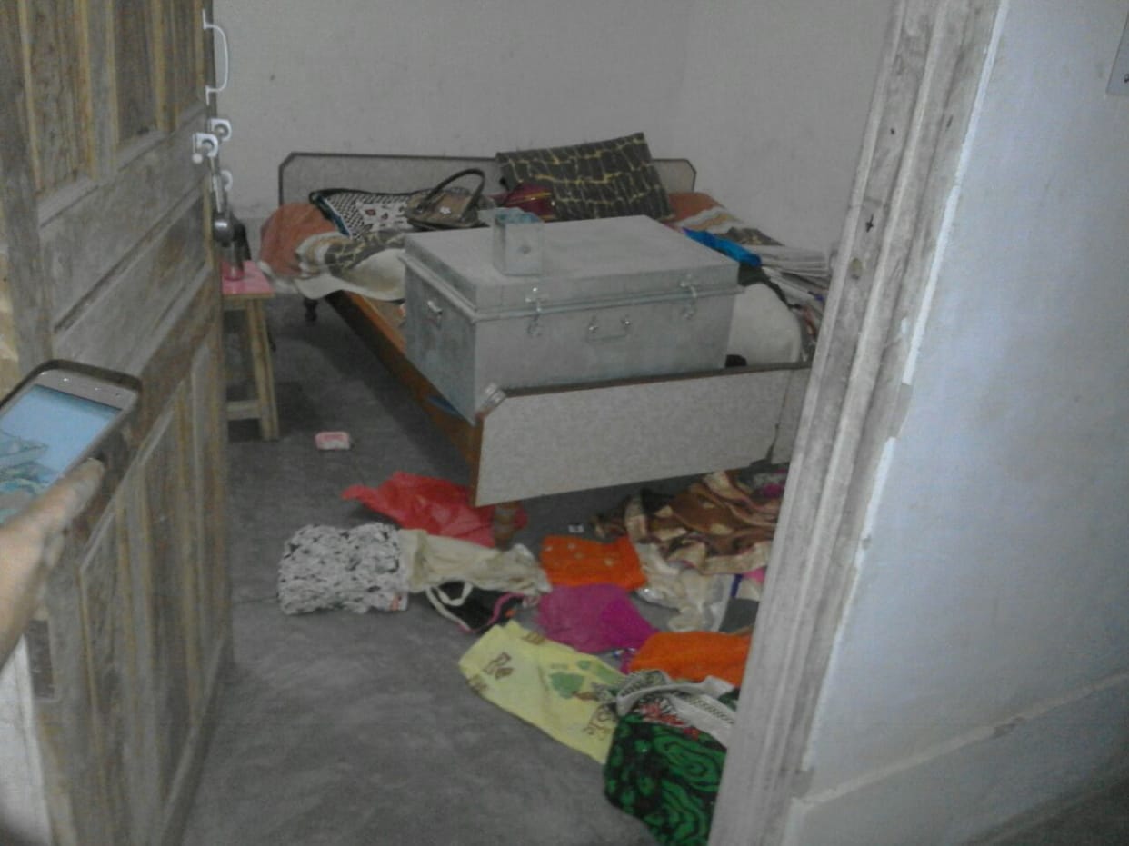 Robbery in house by placing a firearm on innocent in muradnagar
