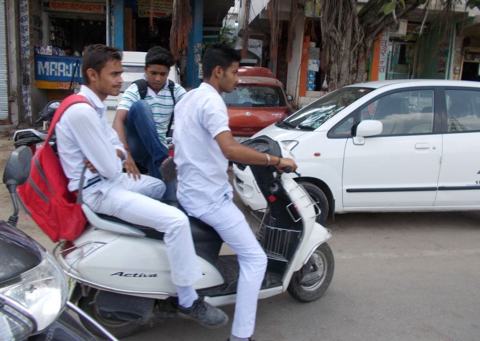 Teen on bike sprint fill