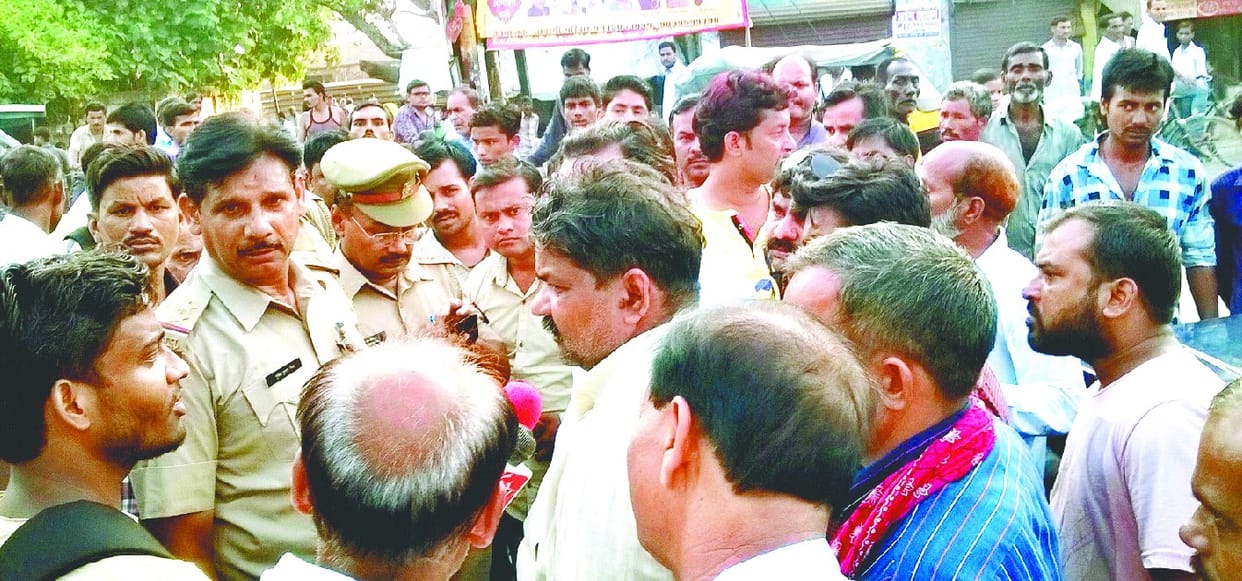 Middle-aged truck driver in front of the police station to the beat