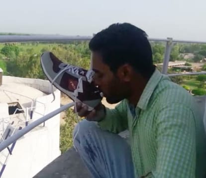 teachers climbed on water tank outside cm badal house and drink water with shoes