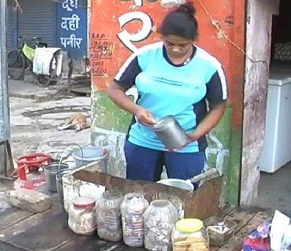 state and national level 7 gold medalist weight lifter santosh selling tea for survival