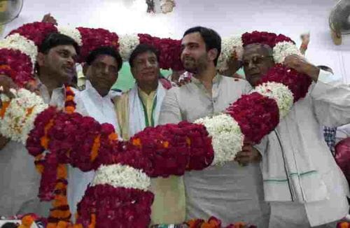 Supporters, including former ministers joined RLD