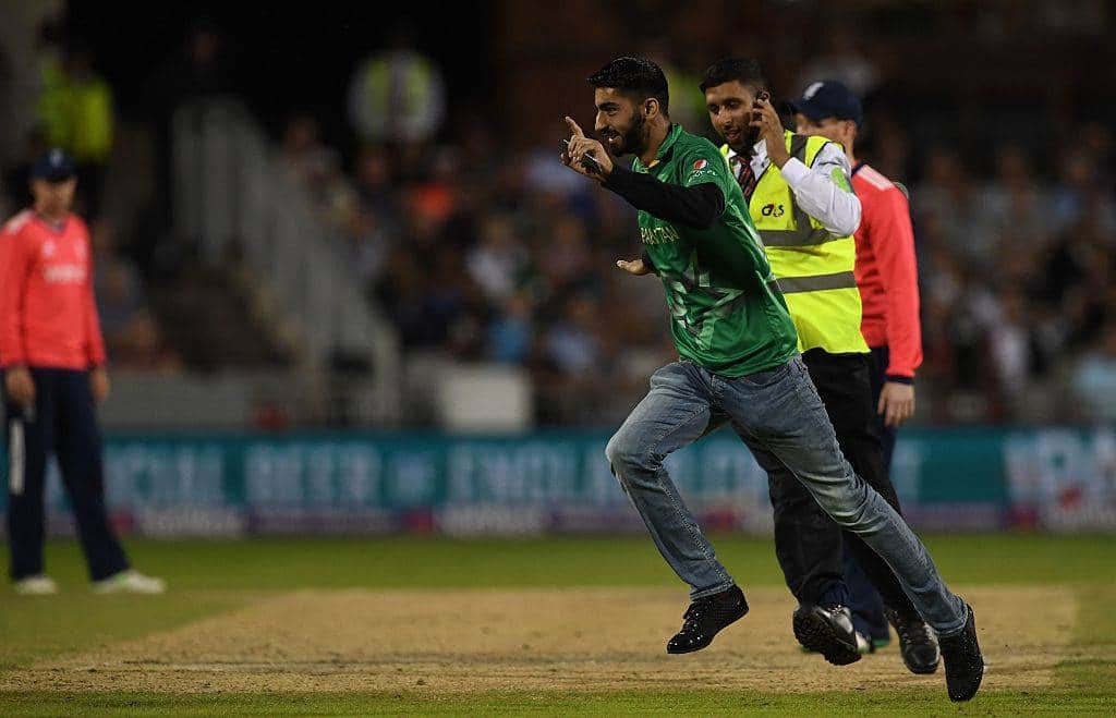 A Pakistan fan invades the pitch during t20 match