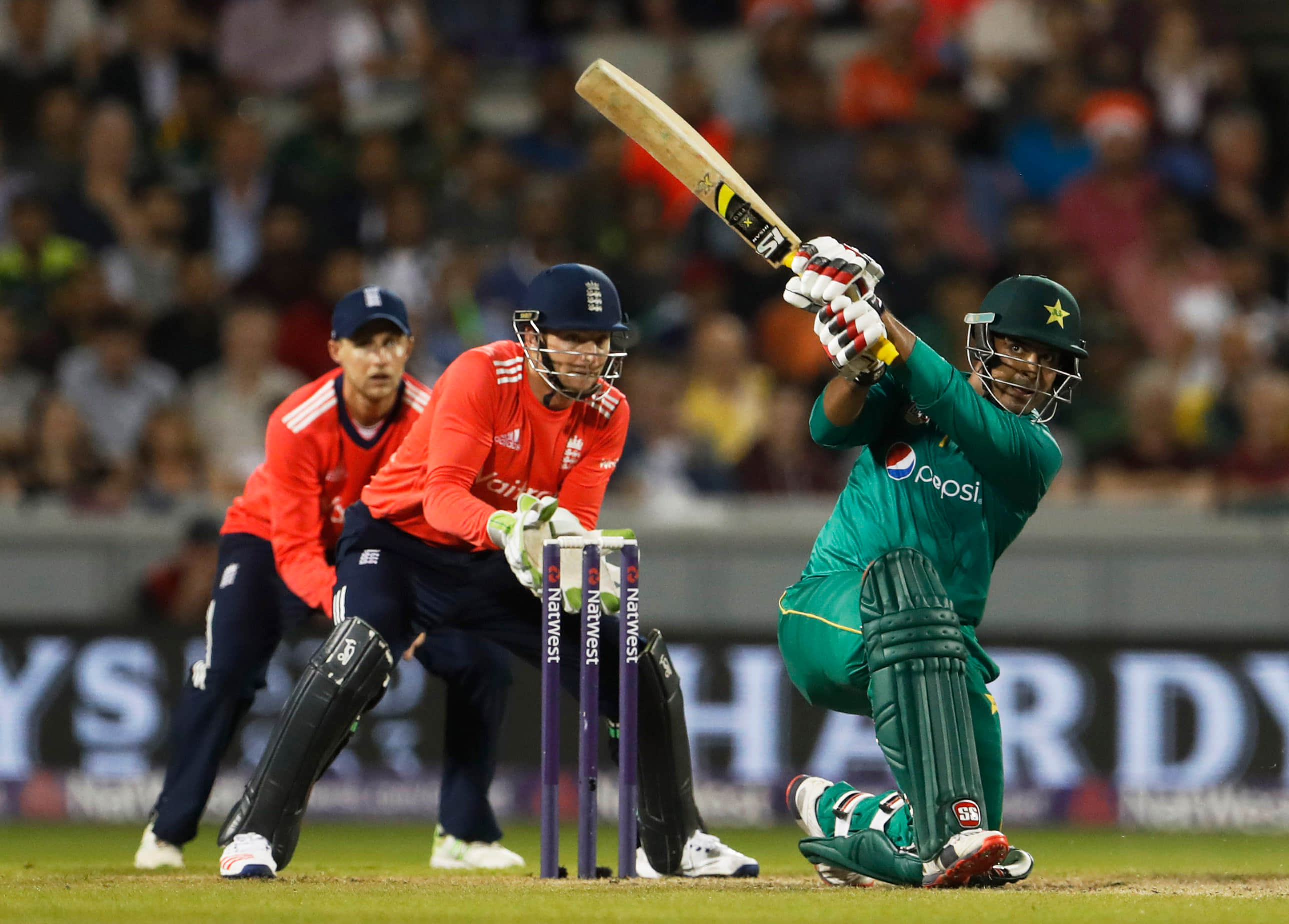 A Pakistan fan invades the pitch during t20 match