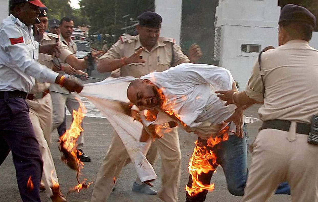 Man tries to immolate himself demanding arrest of outgoing MP Governor Ram Naresh Yadav