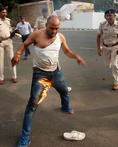 Man tries to immolate himself demanding arrest of outgoing MP Governor Ram Naresh Yadav