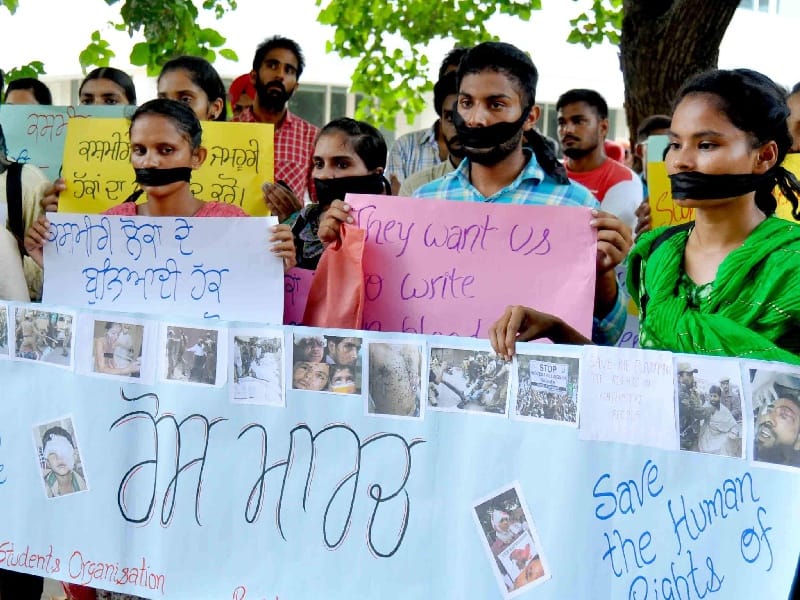  Punjabi University,India anti-poster, Hindu groups, performing demanding action, Patiala
