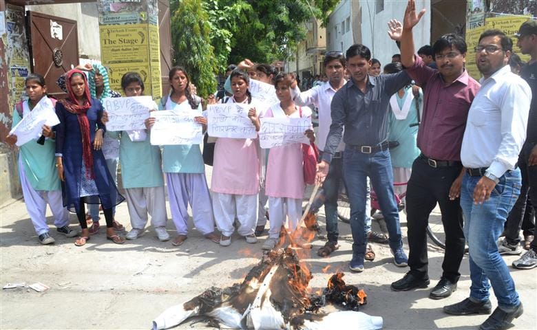 ABVP burnt effigies of girl students