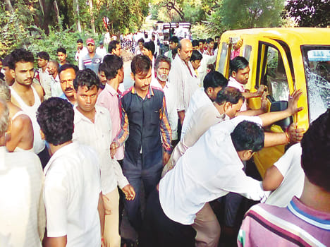 Two school vehicles clashed van driver killed, dozen injured