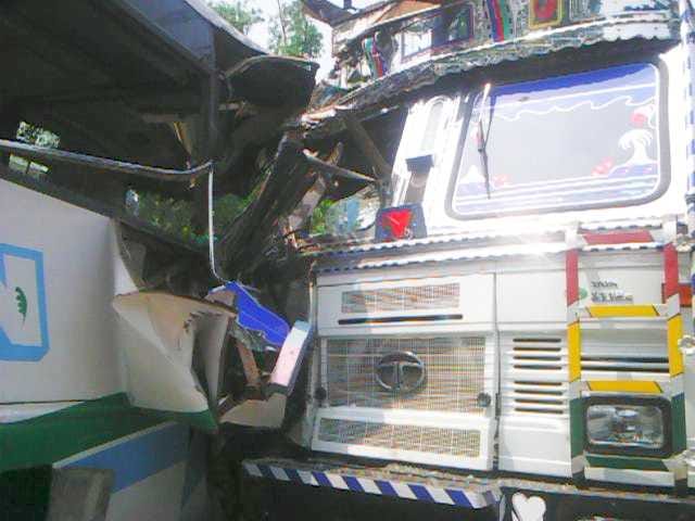 Driver killed in bus-truck collision  