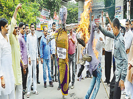 Burned effigies of President and EO members