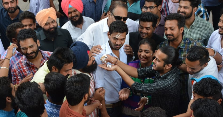 PUSU students cut the cake at Student center punjab university