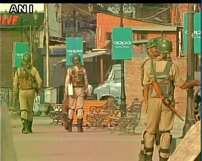 Army flag marches in Pulwama after a clash between security forces and protesters