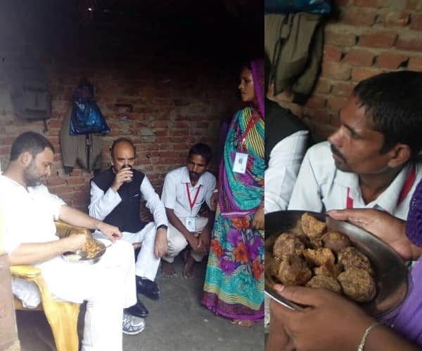 rahul gandhi takes food in a home of dalit during kisan yatra.