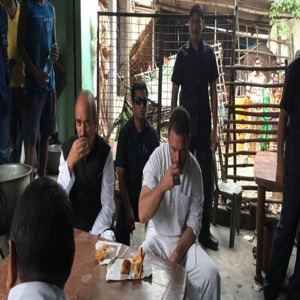 rahul gandhi desi style: eats food in a home of dalit during kisan yatra