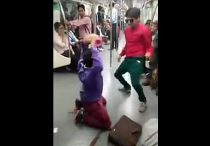 Boys dancing in Delhi metro