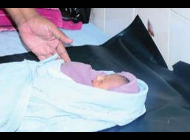  mother father planned to bury their four day old girl in Karnatka