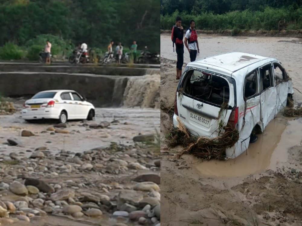 after heavy rain vehicle flows in flood