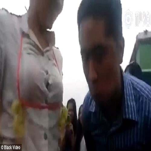 Male staff compete to eat grapes hung around female co-workers' BREASTS 