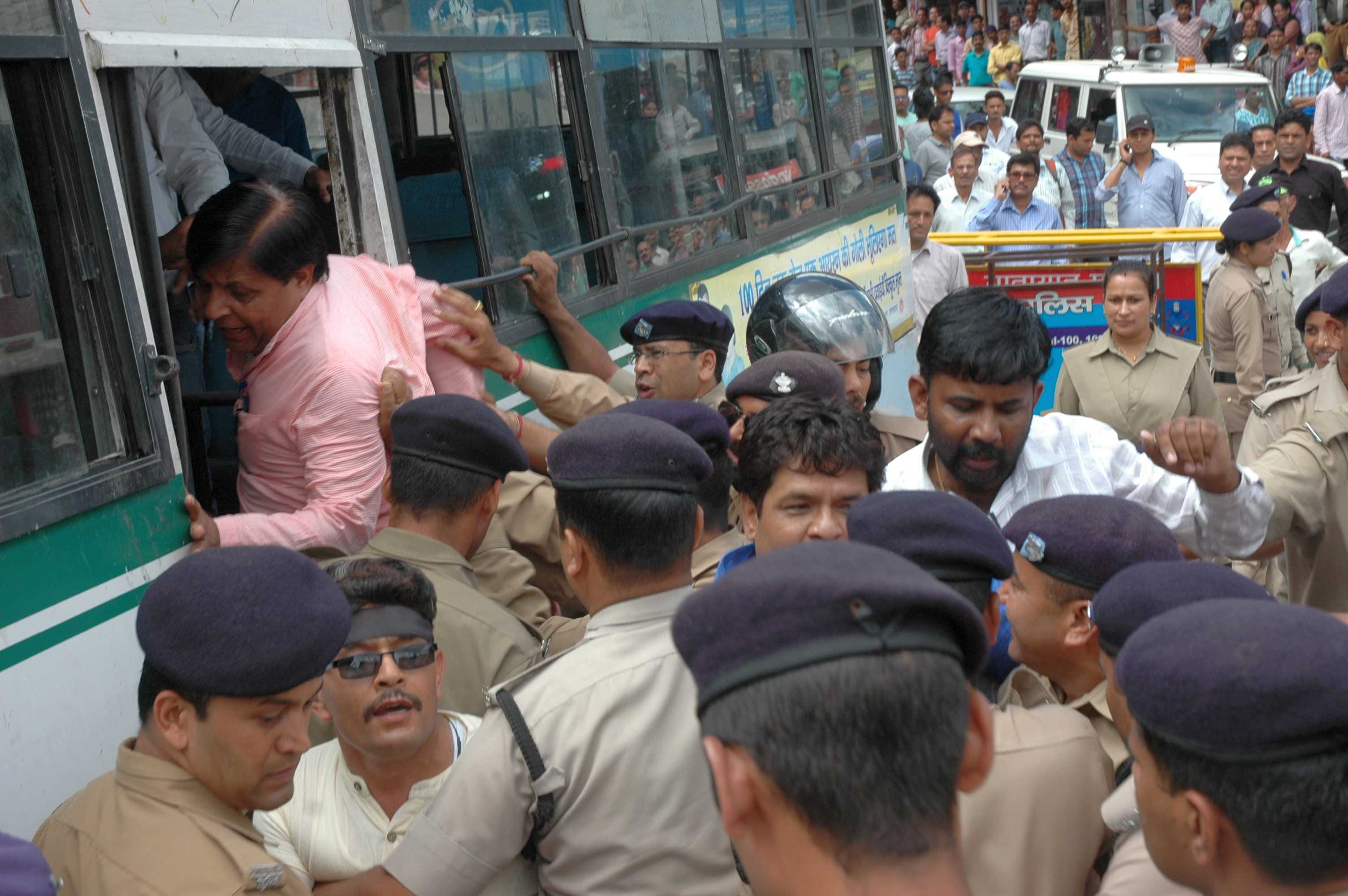 bjp worker protest cm, police lathi charge.