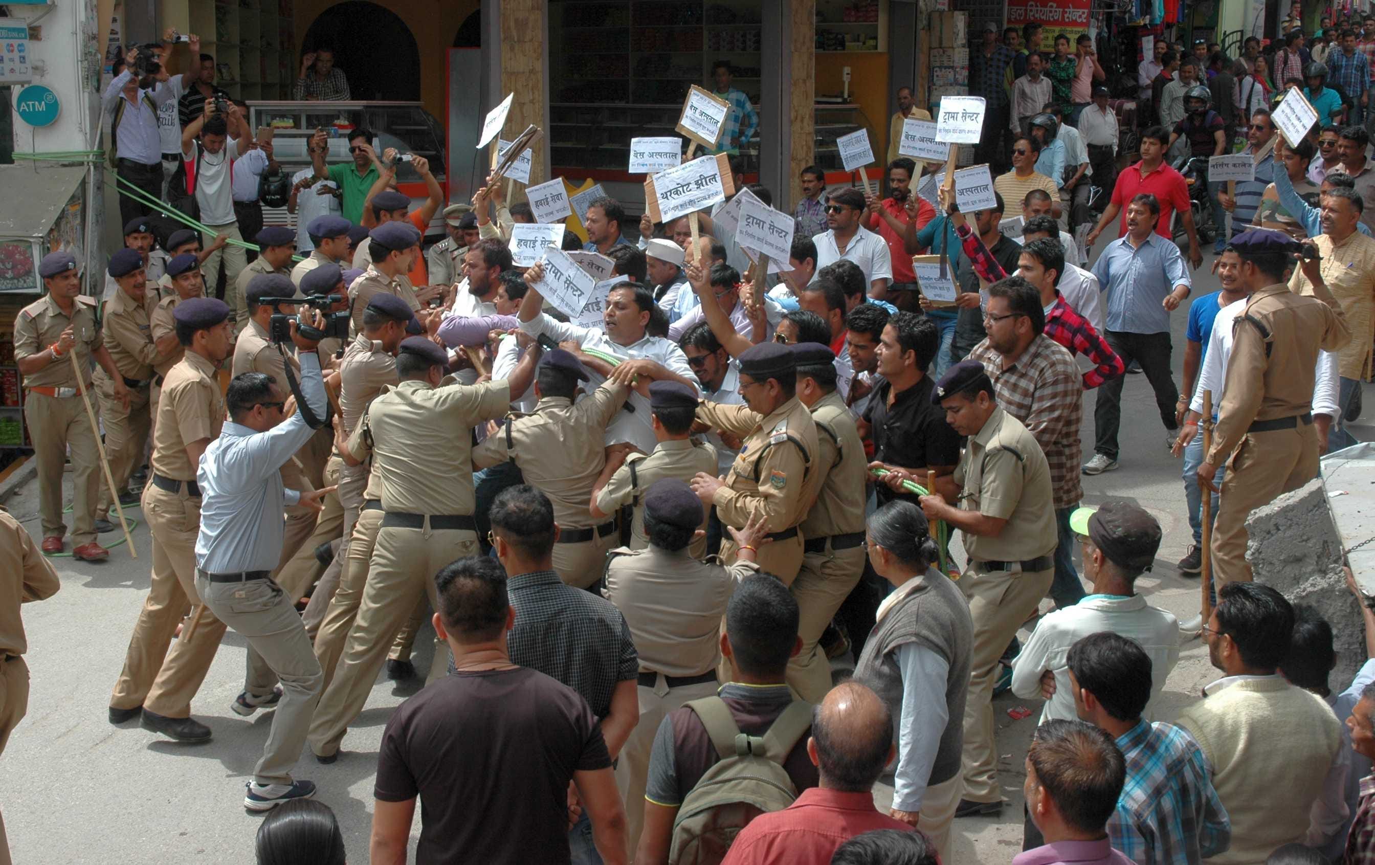 bjp worker protest cm, police lathi charge.