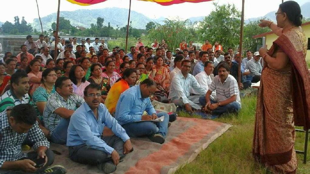 Four absent teacher suspended
