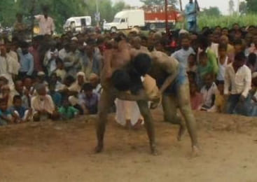 Wrestlers shown stake