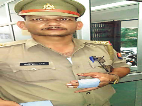 cop beat si